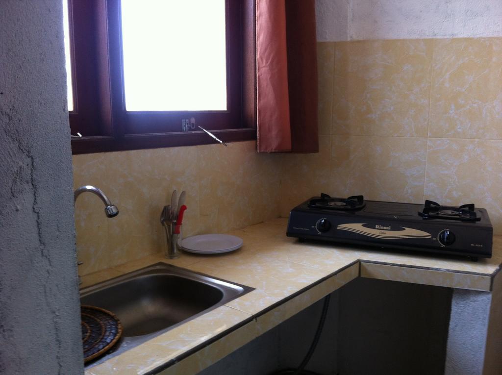 Amed Sari Beach Guesthouse Room photo