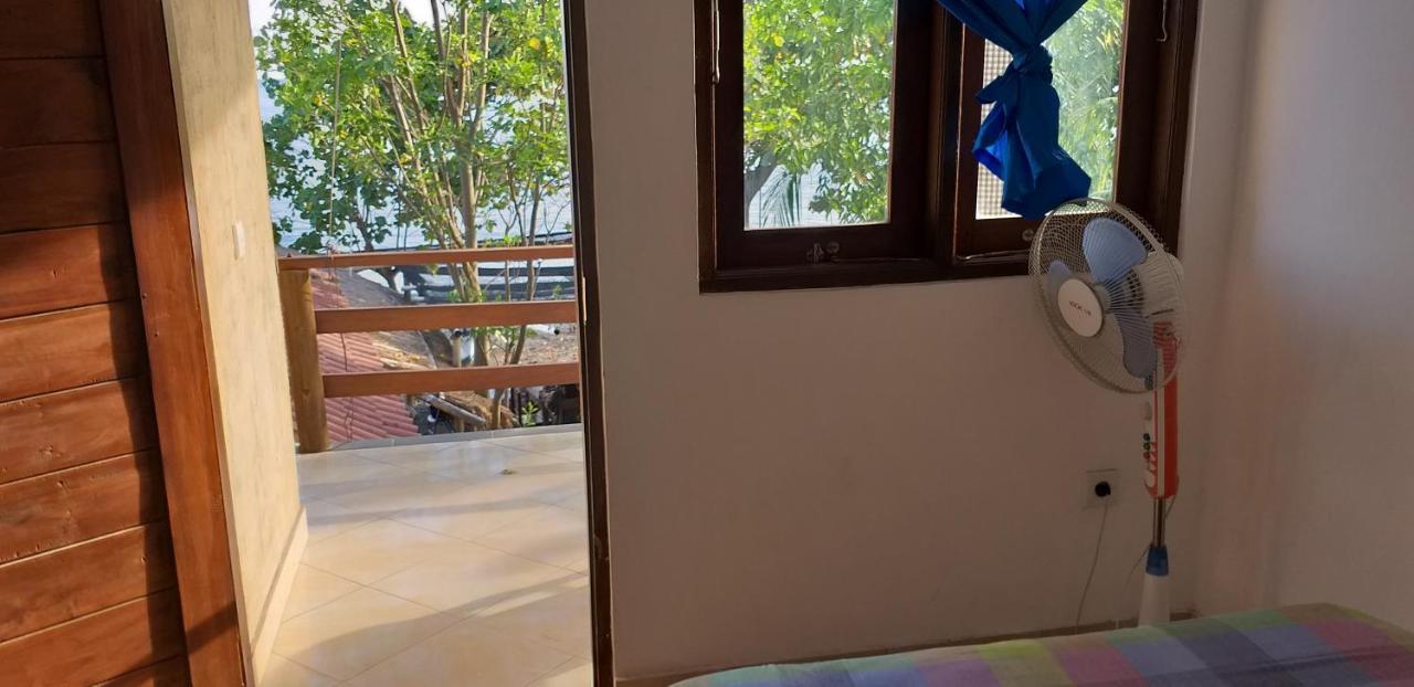 Amed Sari Beach Guesthouse Exterior photo